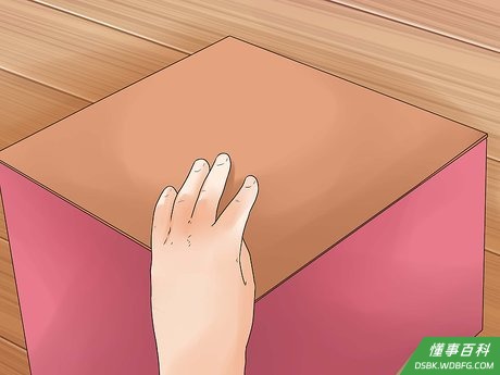 Step 3 用硬纸板和毛巾遮盖模具。