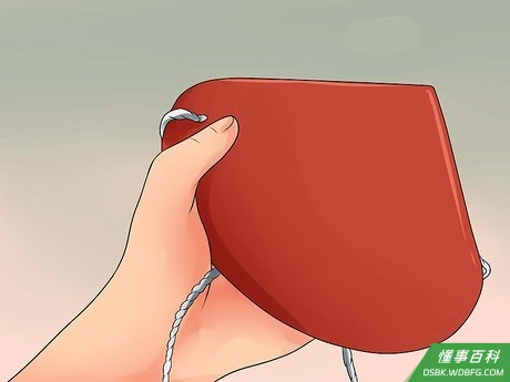 Step 5 用纸做一顶传统的中国帽子。
