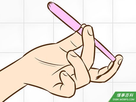 Step 3 抓住棉条的手柄。
