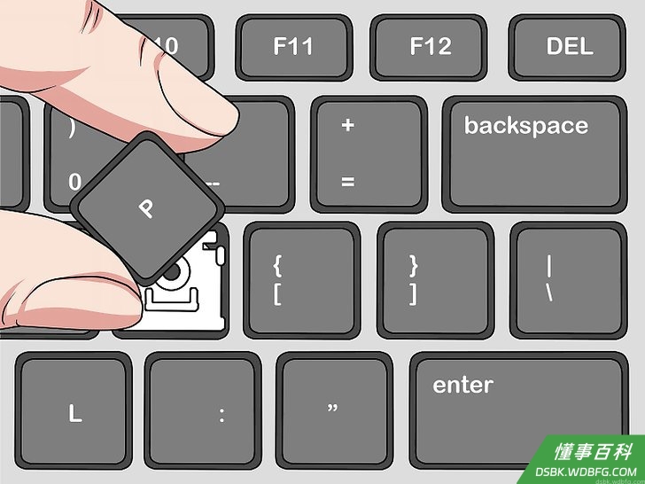 Step 2 把按键底部放入槽中。